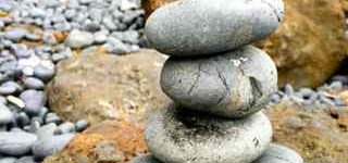 Rock cairn representing self care balance